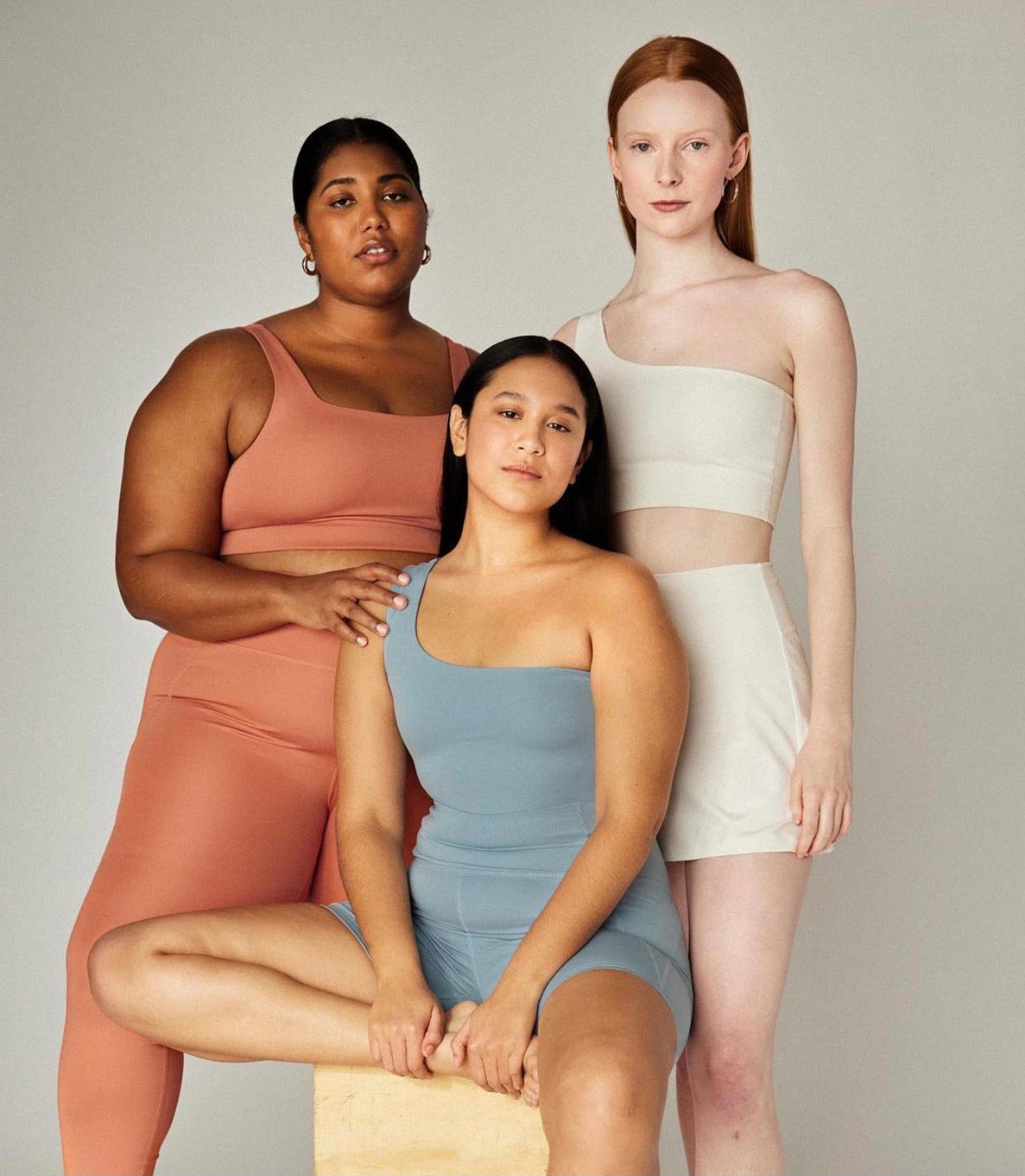 Three women modeling Girlfriend activewear