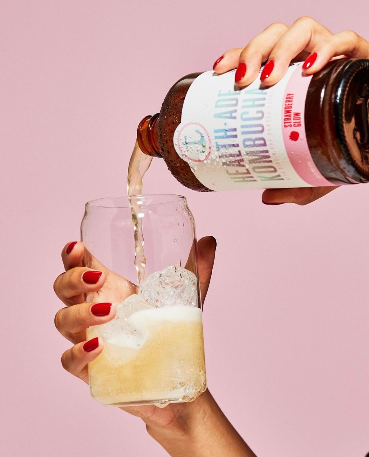 Health-Ade Kombucha Pouring in a Glass