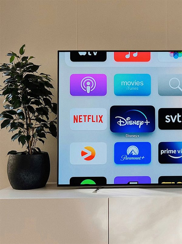TV screen displaying different apps, like Netflix, Paramount+, and YouTube