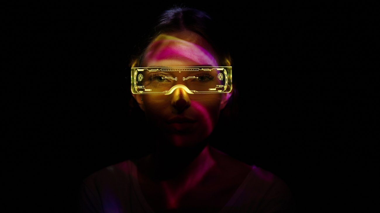 Woman with futuristic meta verse glasses