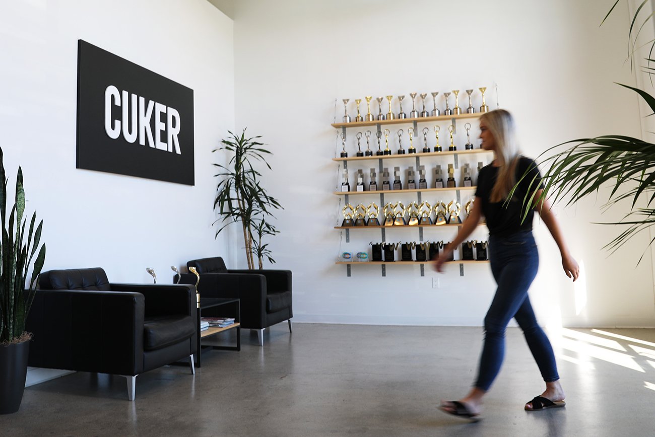 Cuker office lobby with shelves of industry awards for CPG and digital work
